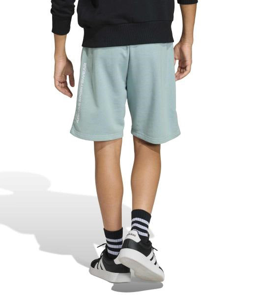 Adidas Shorts Slogan KG5194 Tactile Green – shorts bambino indossati, vista posteriore