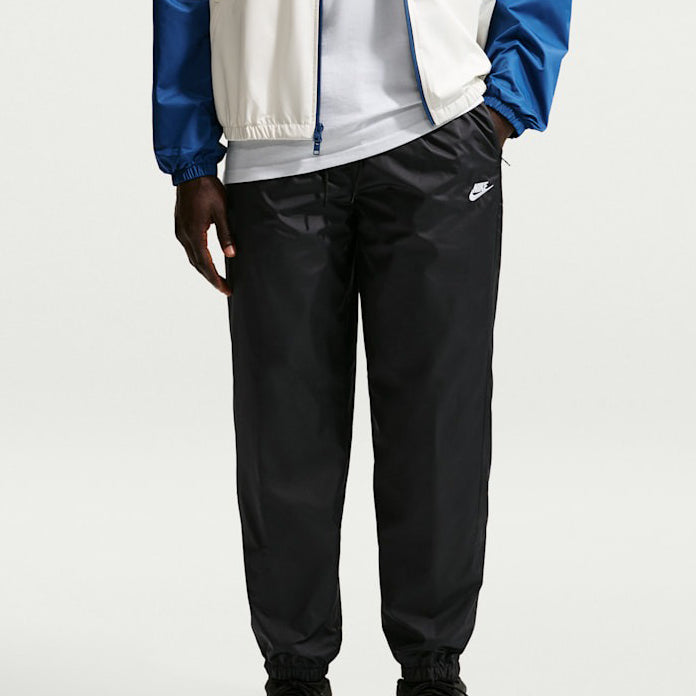 Pantaloni con fodera Nike Windrunner HV8371-010 Nero/Bianco Uomo