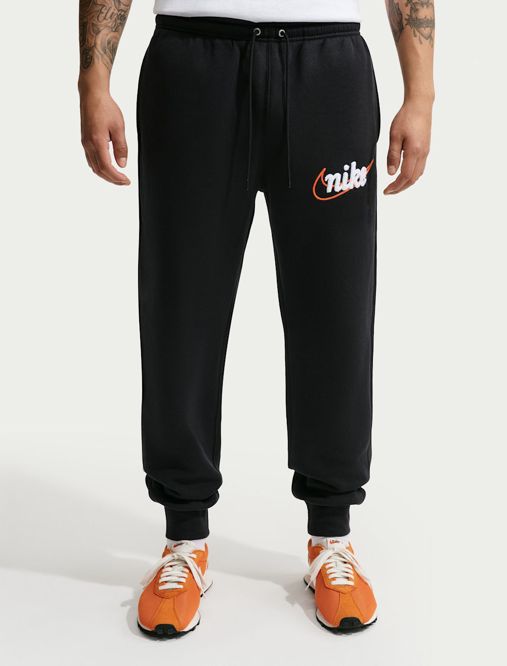 Jogger Nike Sportswear Club IF0699-011 Black/Safety Orange Uomo