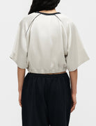 Top oversize satin Nike Sportswear IH1330-072 donna colore Light Bone/(Black)