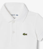 Body Lacoste 5W1100 bianco neonato - piqué cotone biologico, colletto polo, coccodrillo ricamato, taglie 3M-9M