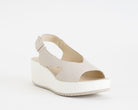 Sandalo con zeppa IGI&CO 1161733 panna da donna, tomaia in pelle e cinturino con strappo, zeppa 55 mm
