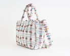 Borsa a spalla Marc Ellis Buby M Indy 26 Variant 10 – vista laterale, profilo H.30×L.48×P.17 cm con tracolla in tessuto regolabile e tirazip logato
