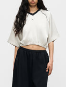 Top oversize satin Nike Sportswear IH1330-072 donna colore Light Bone/(Black)