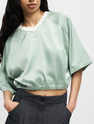 Top oversize satin Nike Sportswear IH1330-006 donna colore Steam/(Sail)