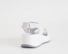 Sandali con zeppa IGI&CO 1163422 in nabuk bianco da donna, cinturino con strappo, suola in gomma, altezza 50 mm