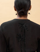 Camicia annodata con dettagli tono su tono Lola Casademunt LS2615009 