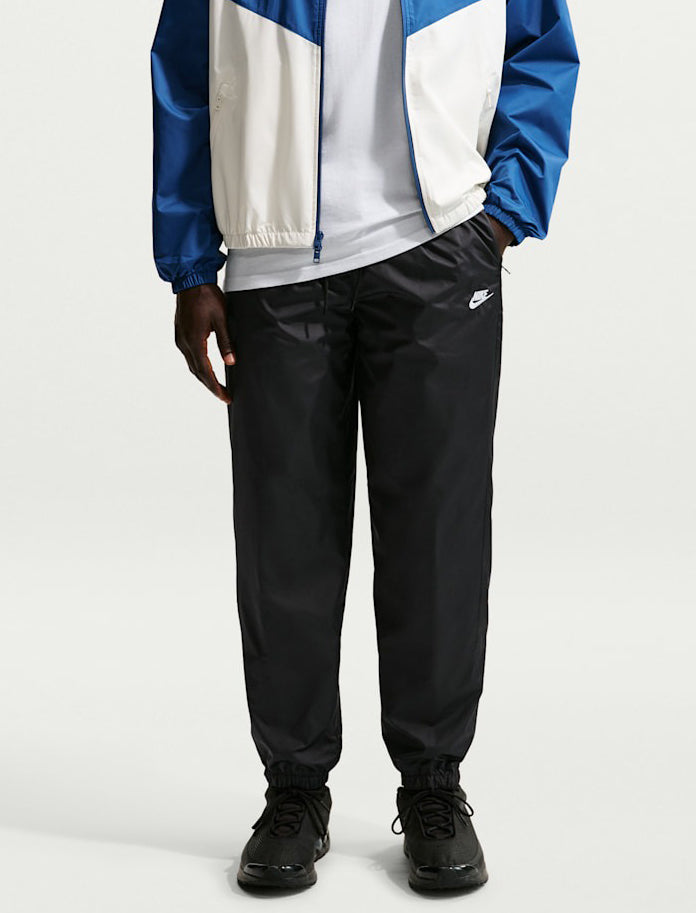 Pantaloni con fodera Nike Windrunner HV8371-010 Nero/Bianco Uomo