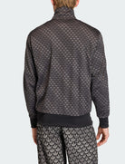 Vista posteriore giacca Adidas Monogram Loose Firebird KC9158 nera uomo
