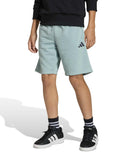 Adidas Shorts Slogan KG5194 Tactile Green – shorts bambino indossati, vista frontale
